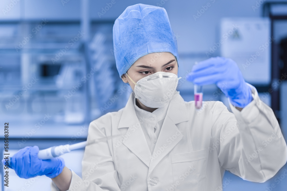 Female scientist working in the laboratory. Female scientist working in the laboratory.