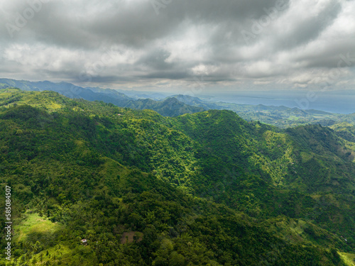 Top view of mountains and hills with tropical vegetation and farmland. Negros, Philippines © Alex Traveler
