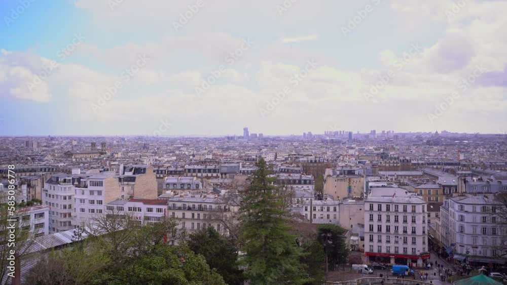 Street in the center of Paris with old buildings, spring with blooming trees. Slow motion. Panoramic view. Street in the center of Paris with old buildings, spring with blooming trees. Slow motion. Panoramic view.