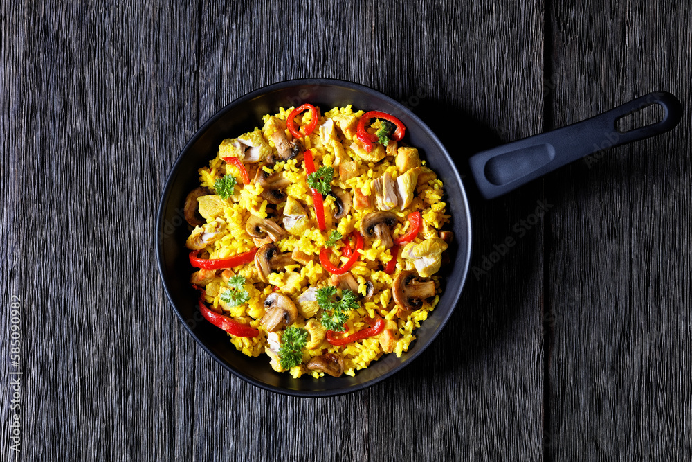 Chicken Paella with mushrooms, red pepper, spices Chicken Paella with mushrooms, red pepper, spices