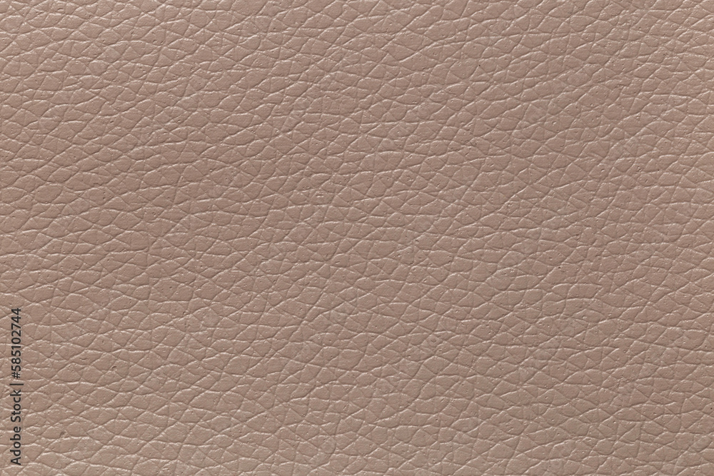 Grayish orange leather and a textured background. Grayish orange leather and a textured background.