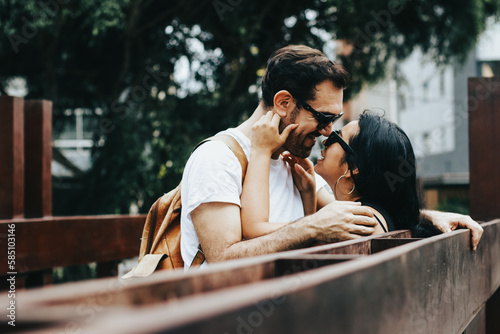 Photograph of couple looking at each other very happy enjoying the day. Concept of couples, lifestyle and love.