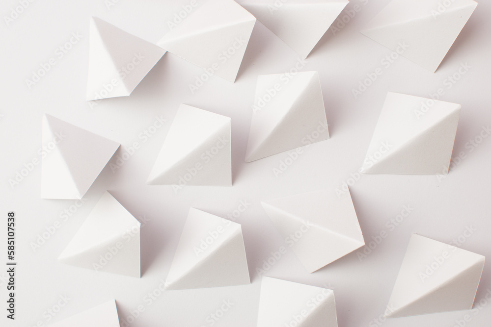 White abstract triangle shapes on white background White abstract triangle shapes on white background