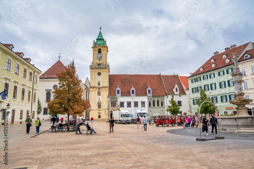 Bratislava, Slovakia - August 23, 2022: Tourists along the city center on a summer day