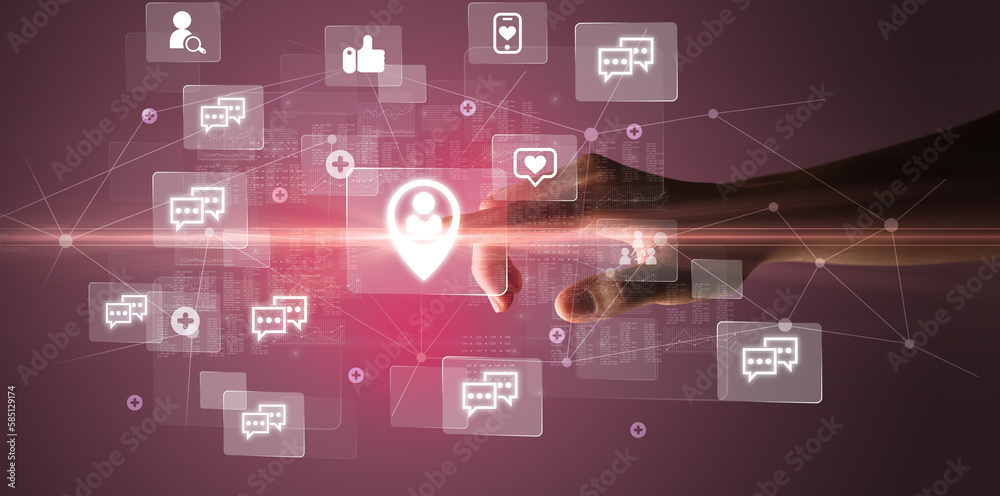 Hand pressing social media multimedia application screen with media icons on futuristic concept Hand pressing social media multimedia application screen with media icons on futuristic concept