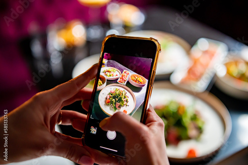 Wallpaper Mural hand with smartphone photographing food at restaurant or cafe Torontodigital.ca