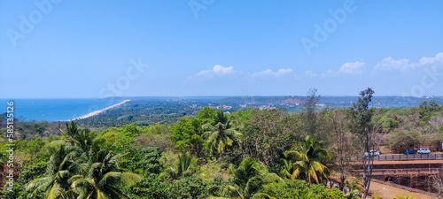 View of the blue skies and sea with the greenery of the beautiful trees. 