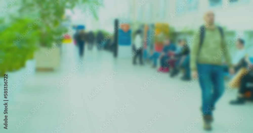 time lapse. modern business life. defocused blurry video. background on the theme of business. blurry silhouettes of unrecognizable people moving fast inside the building.