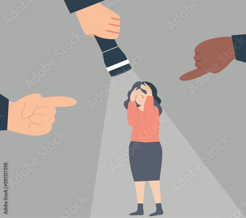A woman victim of bullying. Red-handed teenage girl under the spotlight. Female surrounded by fingers and a flashlight pointed at her. Accusation, blaming concept. Stop abusing, violence against women