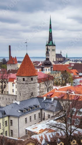 4k Timlapse of aerial view of Tallinn Medieval Old Town in day with cloudy sky, Estonia. Vertical video photo