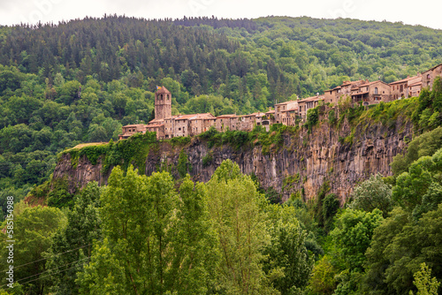 Medieval village Castellfollit De La Roca on the edge of a cliff. Catalonia, Spain. photo