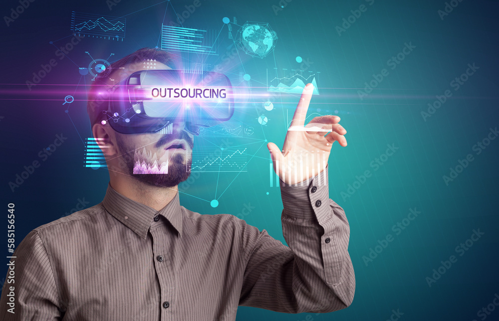 Businessman looking through Virtual Reality glasses Businessman looking through Virtual Reality glasses