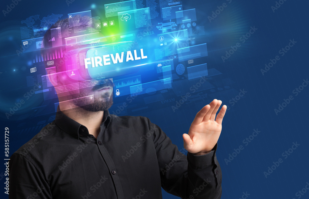 Businessman looking through Virtual Reality glasses Businessman looking through Virtual Reality glasses