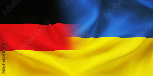 German Ukrainian flag together.Germany Ukraine waving flag background