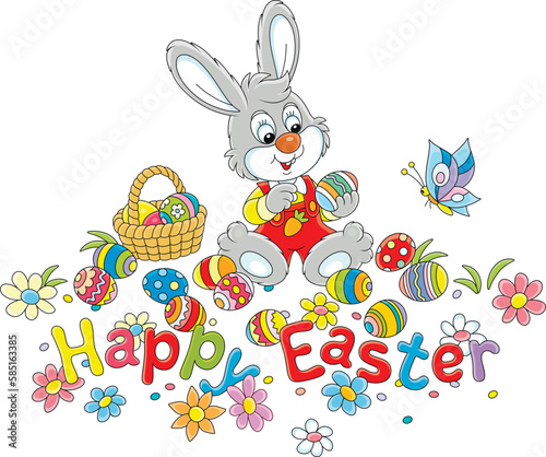 Easter card with a happy little bunny, a wicker basket and painted gift eggs on a pretty spring lawn with colorful flowers and a merrily fluttering butterfly, vector cartoon
