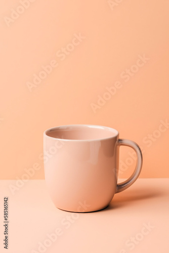 Creative handcraft ceramic mug for coffee or tea isolated on beige background, minimalist mug. Generative AI