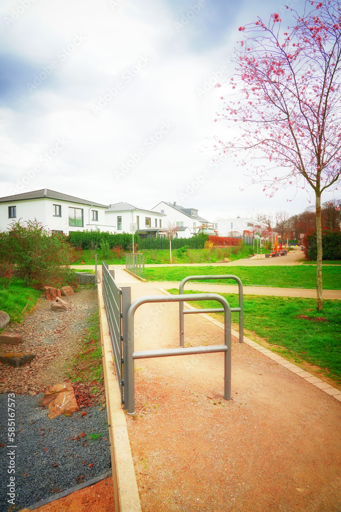 Barrier bar, barrier railing, tubular bar for safety protection and protection against danger. For securing sidewalks, blocking off green spaces with a passage, on the sidewalk in a settlement Barrier bar, barrier railing, tubular bar for safety protection and protection against danger. For securing sidewalks, blocking off green spaces with a passage, on the sidewalk in a settlement