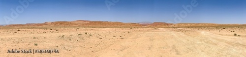 Panorama view of the hot dry moroccan desert in the midday sun
