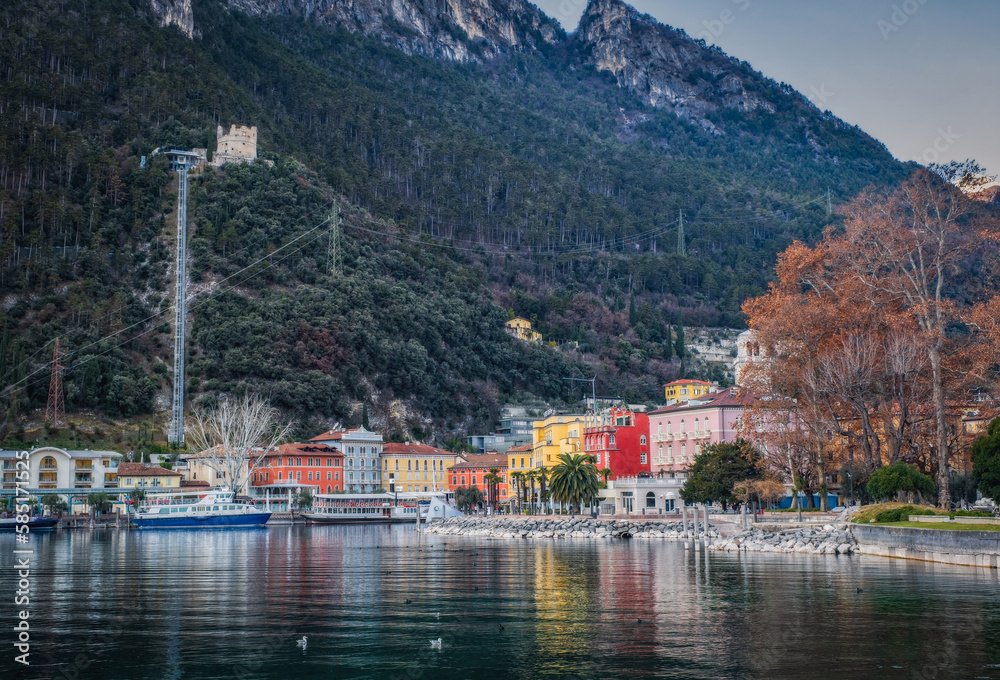 Fototapeta premium City of Riva del Garda at sunset time in January 2023.