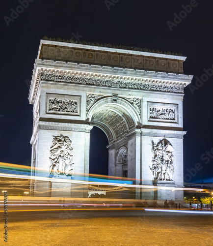 Triumphal arch (Arc de Triomphe) at night, Paris, France © Mistervlad