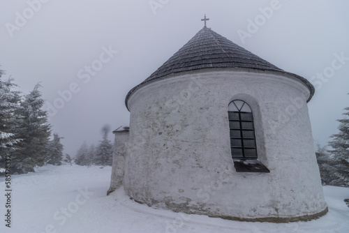 Winter view of Kunstatska kaple chapel in Orlicke hory mountains, Czech Republic