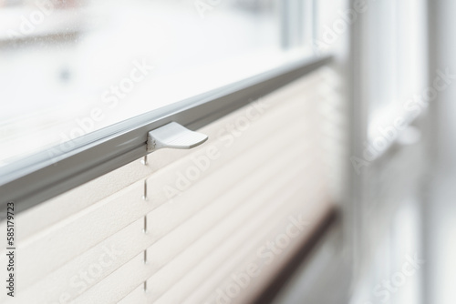 closeup of new pleated blind jalousie in bedroom photo
