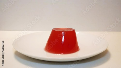 Jelly Jello wobbling on white plate
