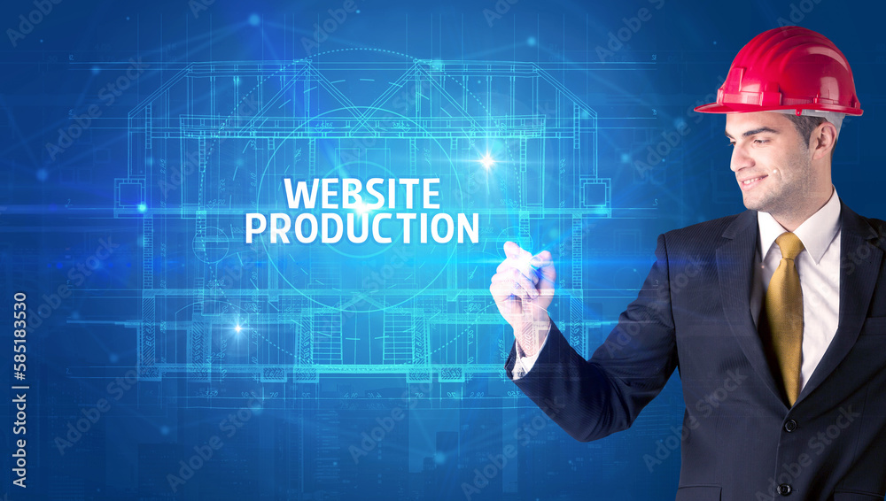 Handsome architect drawing with helmet