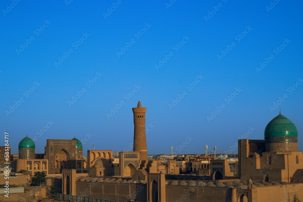 Sunet with panoramic view and Persian architecture in the ancient silk road city of Bukhara, Uzbekistan, Po-i-Kalan Islamic religious complex