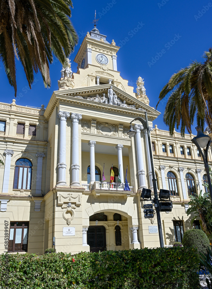 Street view of historic city hall building in the city of Malaga, Spain.