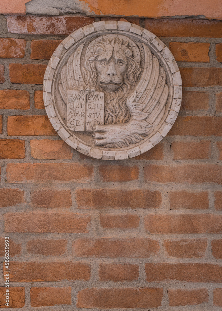 architectural detail - Venice's winged lion on a wall architectural detail - Venice's winged lion on a wall