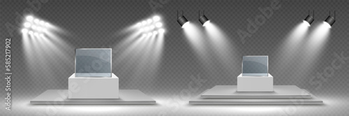 Glass showcase for the exhibition in the form of a cube. Background for sale illuminated by spotlights. Museum glass box isolated advertising or business design boutique. Exhibition hall.
