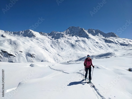 Ski touring track through the deep snow in a beautiful lonely mountain landscape. Sentisch Horn. Skitouring  Skitour  Ski Tour  Skimo  Davos Klosters Switzerland. High quality photo