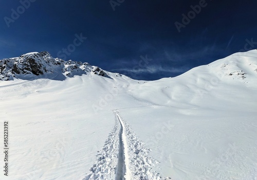 Ski mountaineering on the Bülenhorn above Davos Monstein. Ski touring in a beautiful mountain world. Climb the Swiss Alps. Hiking through deep snow. High quality photo photo