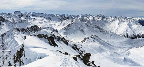 Mountain tour on the peak Älplihorn above Monstein Sertig Davos. Fantastic panoramic view of the snowy mountains. Mountaineering in winter. enjoy life. High quality photo photo