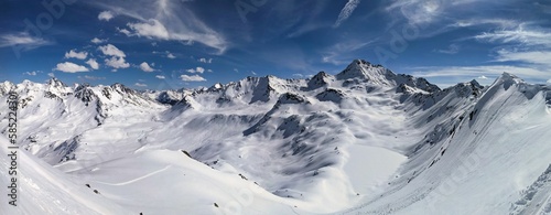 beautiful ski tour in the swiss mountains. Super mountain weather for a long ski tour. High quality photo