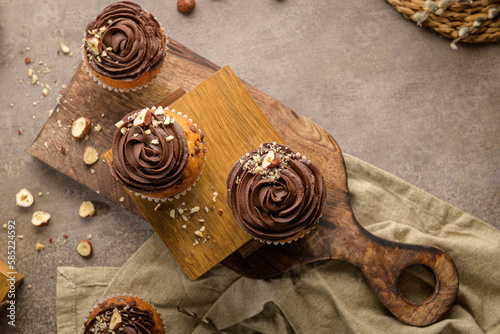 Chocolate chip muffins decorated with chocolate ganache © homydesign