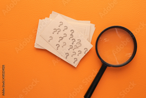 high angle view of question mark on paper on office desk