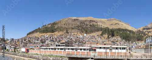 HUANCAVELICA, PERU - JULY 30, 2022: Panoramic view of the Oropesa mountain located next to the Santa Ana neighborhood of the city of Huancavelica.