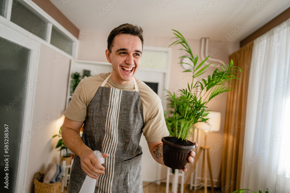 man gardener florist take care grow cultivate plants at home man gardener florist take care grow cultivate plants at home