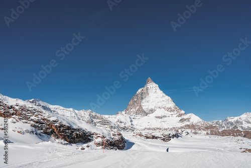 Scenic sunrise or sunset view of Matterhorn - one of the most famous and iconic Swiss mountains  Zermatt  Valais  Switzerland