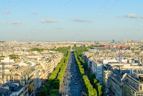 The Avenue des Champs-elysees and the Louvre , in Europe, France, Ile de France, Paris, in summer, on a sunny day.
