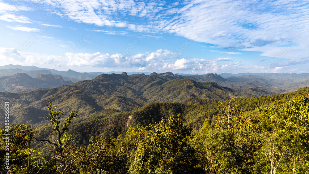 Scenic look out point of rolling hills and blue sky along Mae Hong Son and Pai loop route in Northern Thailand