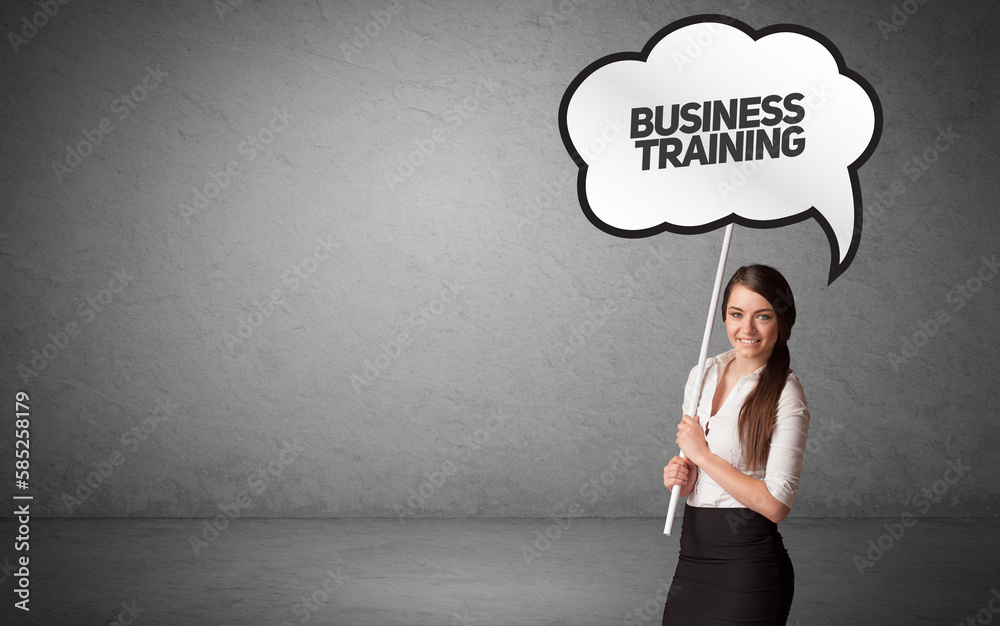 business person in casual holding road sign business person in casual holding road sign