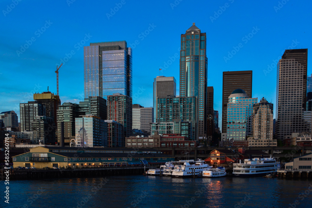 Seattle waterfront skyline Puget Sound downtown Pier 56 blue hour