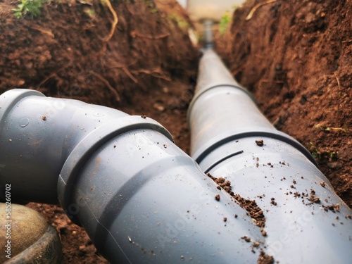 Plastic sawage pipes in the ground for rainwater drainage