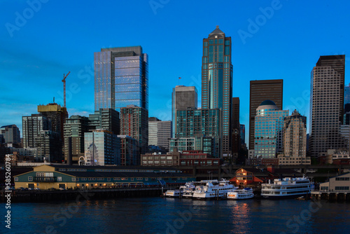 Seattle waterfront skyline Puget Sound downtown Pier 56 blue hour