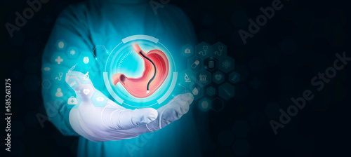 Endoscopic biopsy, esophagogastroduodenoscopy, EGD. Stomach. Medical care for stomach problems. stomach diseases, Isolated Doctor with digital interface on dark background photo