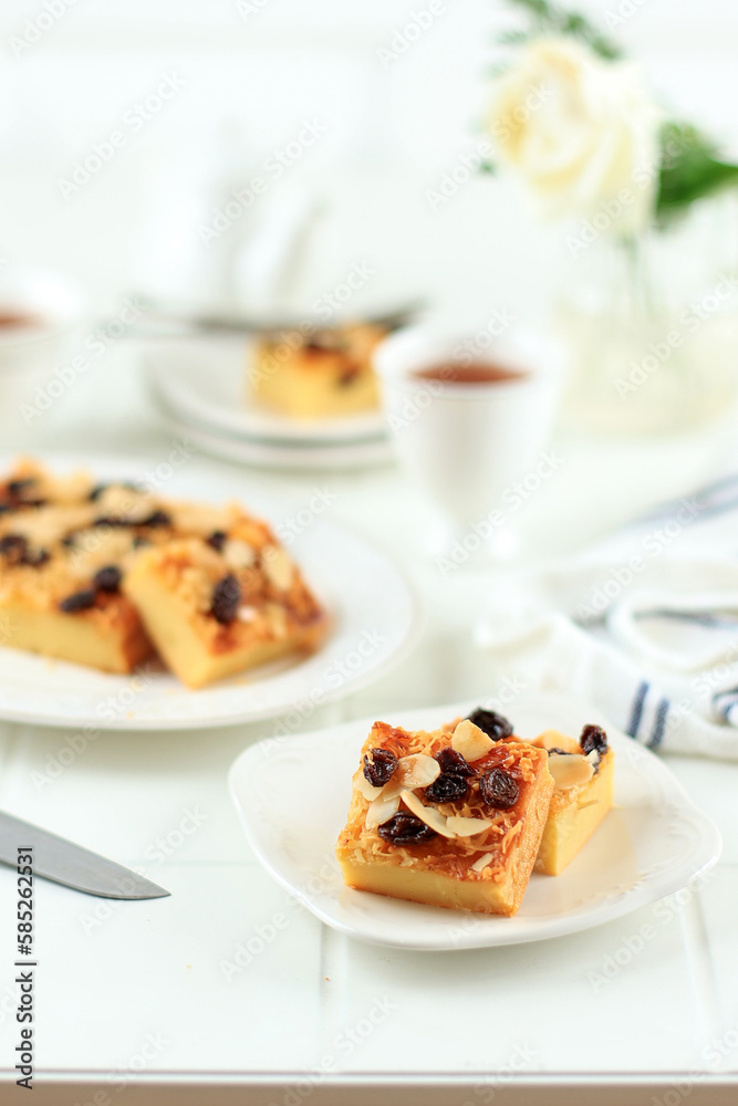 Sliced Homemade Prol Tape or Bolu Tapai on White Plate. Sliced Homemade Prol Tape or Bolu Tapai on White Plate.