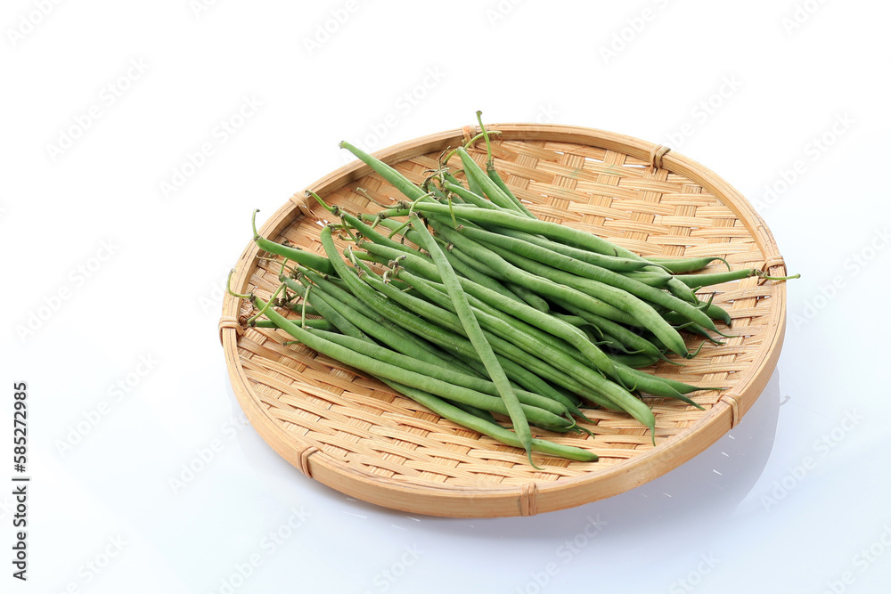 French Green Bean or Buncis on Bamboo Plate French Green Bean or Buncis on Bamboo Plate